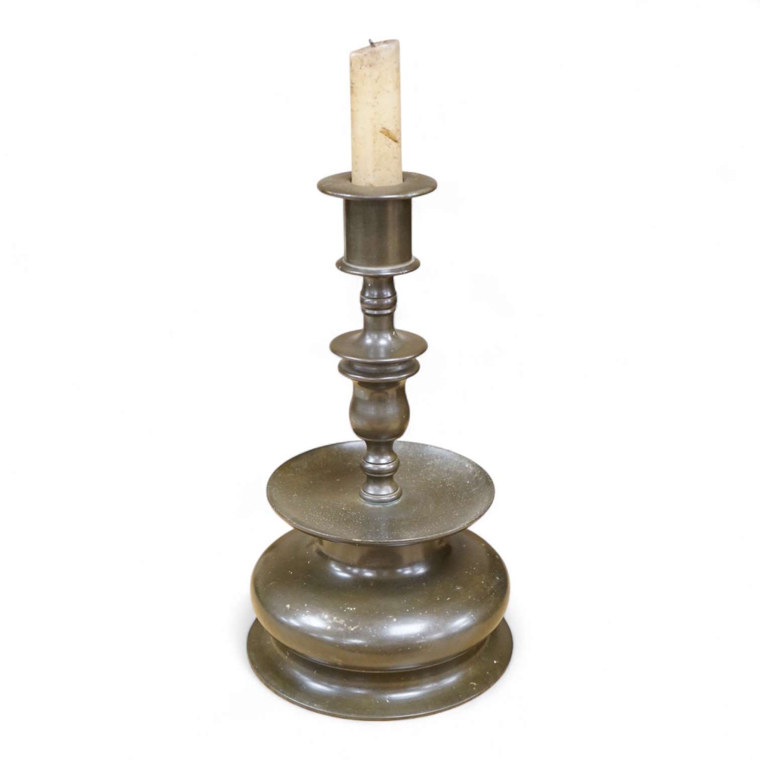 A Dutch bronze candlestick, 24cm high